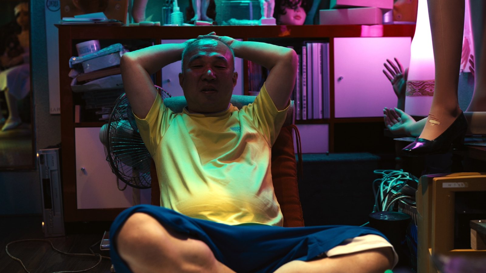 Jacque Rabie and subject Hyodo in a domestic room of dolls, low light and detail shots